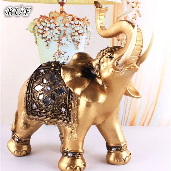 Figurine d’éléphant Feng Shui en résine dorée porte-bonheur. - 1